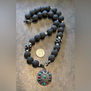 Black lava beads w/ sterling centerpiece & clasp 17”
